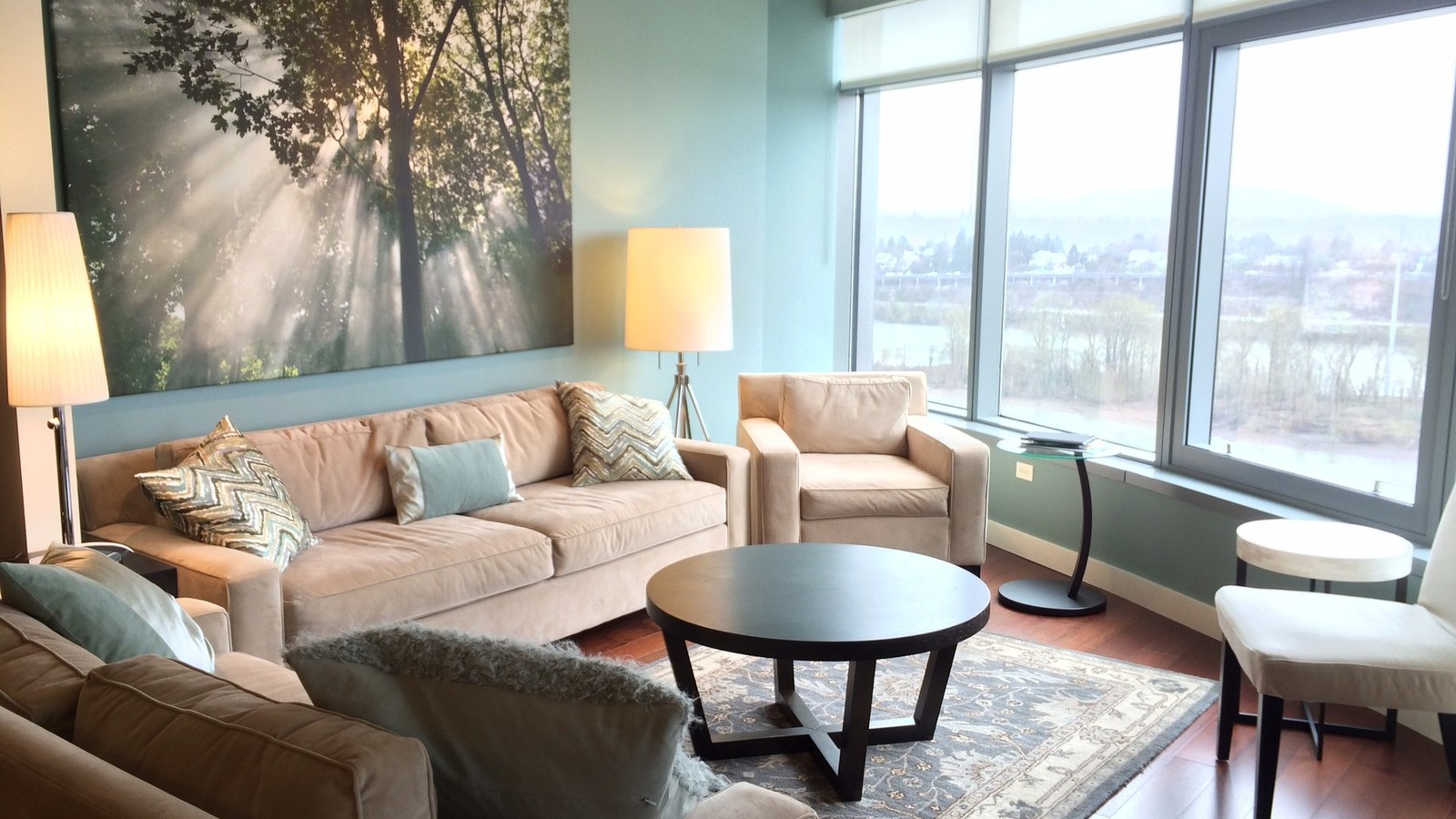 Painted living room with large windows