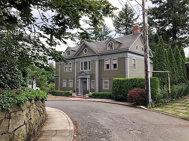 Painted Portland-area home on a tree-lined street
