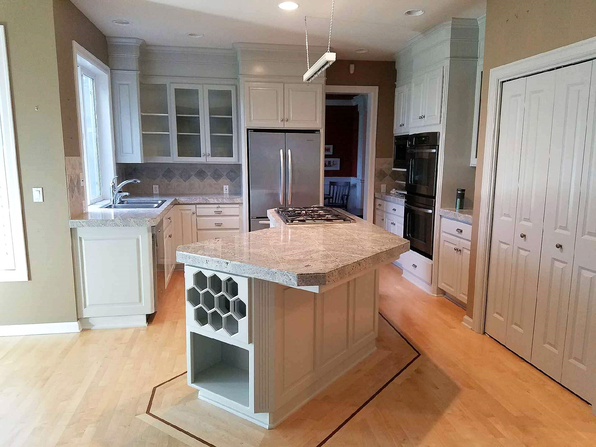 Refinished kitchen cabinets and island