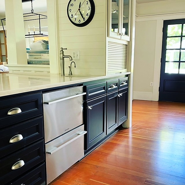 Kitchen with dark refinished cabinets